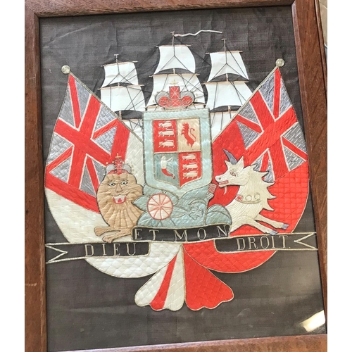 691 - A VICTORIAN NAVAL NEEDLEWORK PANEL. The panel finely worked with a central Royal Coat of Arms with R... 