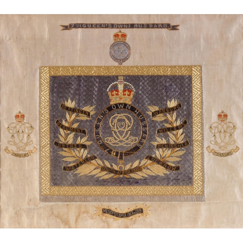 694 - A 7TH (QUEEN'S OWN) HUSSARS NEEDLEWORK CREST. Finely worked against cream silk with a central panel ... 