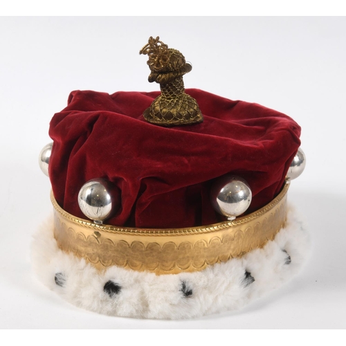 697 - A SET OF RED VELVET ROBES AND CORONET WORN BY A LORD AT THE CORONATION. The Coronet with six silver ... 