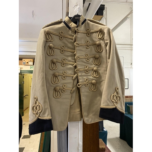 701 - AN 8TH PUNJAB MESS KIT JACKET AND TWO OTHERS. An 8th Panjab Mess jacket, light brown with a dark blu... 