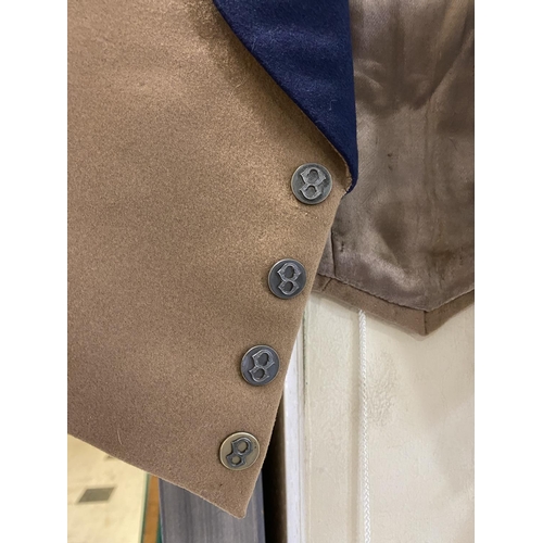 701 - AN 8TH PUNJAB MESS KIT JACKET AND TWO OTHERS. An 8th Panjab Mess jacket, light brown with a dark blu... 