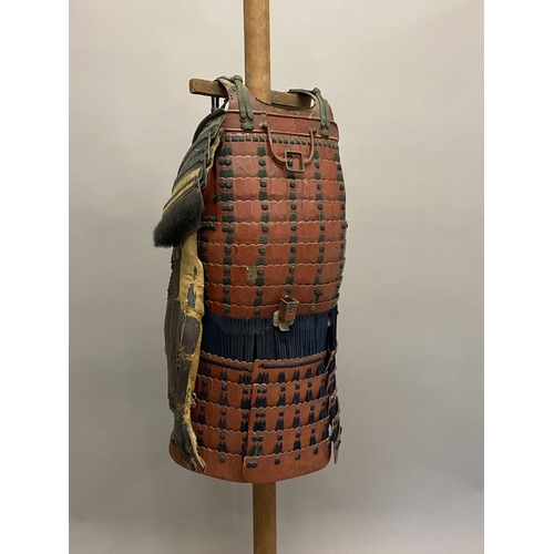 707 - A COLLECTION OF 19TH CENTURY TRADITIONAL JAPANESE ARMOUR. The body armour with chest and back guard ... 