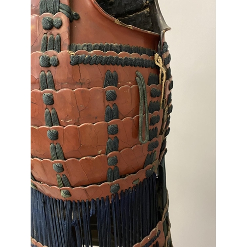 707 - A COLLECTION OF 19TH CENTURY TRADITIONAL JAPANESE ARMOUR. The body armour with chest and back guard ... 