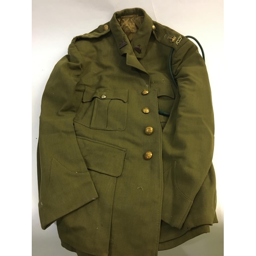 711 - A COLLECTION OF DORSET A.C.F. UNIFORM AND ACCESSORIES. Including a four button khaki jacket with 'Th... 