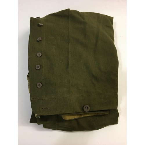 711 - A COLLECTION OF DORSET A.C.F. UNIFORM AND ACCESSORIES. Including a four button khaki jacket with 'Th... 