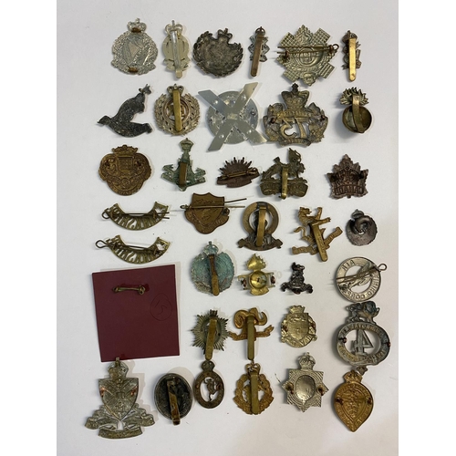 720 - A COLLECTION OF REGIMENTAL CAP BADGES. A collection of thirty seven cap and similar badges to includ... 