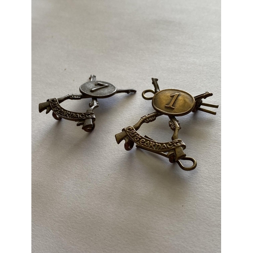 723 - TWO EARLY POST 1924 IRISH REGIMENTAL COLLAR BADGES. Two similar Eire Infantry collar badges with cro... 