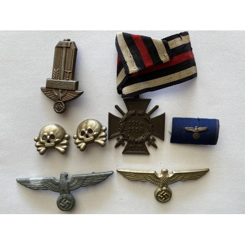 724 - A 1914 IRON CROSS AND A COLLECTION OF OTHER GERMAN BADGES AND MEDALS. A Great War Iron Cross, 2nd Cl... 