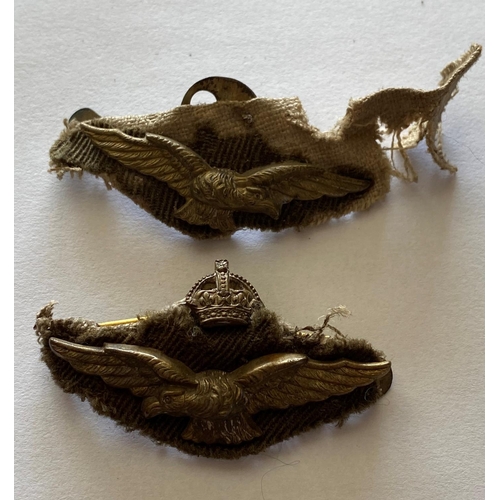 725 - A PAIR OF SECOND WORLD WAR RAF 'PATHFINDER' CUFF BADGES. A pair of flying eagle badges looking to le... 