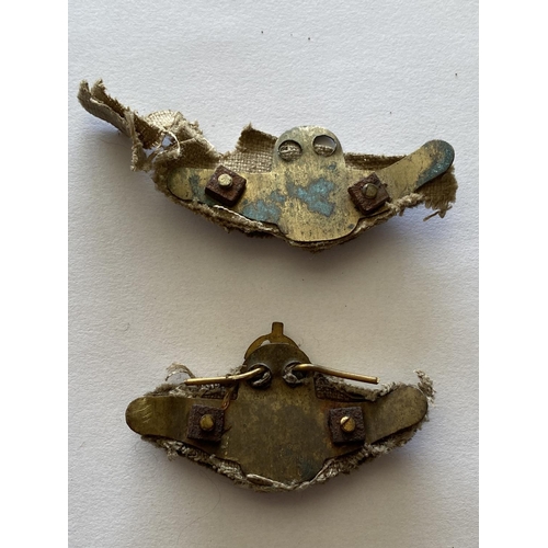 725 - A PAIR OF SECOND WORLD WAR RAF 'PATHFINDER' CUFF BADGES. A pair of flying eagle badges looking to le... 