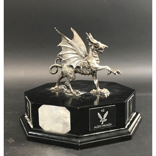 731 - A WELSH GUNNERS PRESENTATION PIECE. A presentation award with a Welsh dragon with wings raised and f... 