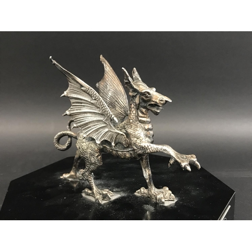 731 - A WELSH GUNNERS PRESENTATION PIECE. A presentation award with a Welsh dragon with wings raised and f... 