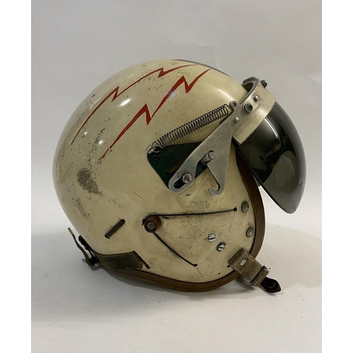 733 - A UNITED STATES AIRFORCE PILOT'S HELMET. A mid 10th century U.S. Airforce helmet, the outer shell pa... 