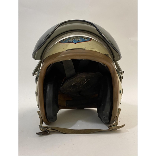 733 - A UNITED STATES AIRFORCE PILOT'S HELMET. A mid 10th century U.S. Airforce helmet, the outer shell pa... 