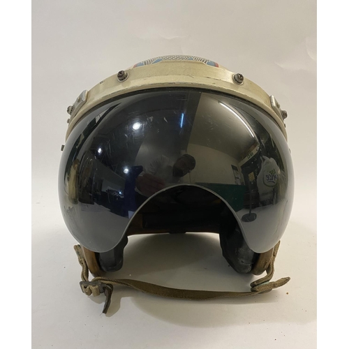 733 - A UNITED STATES AIRFORCE PILOT'S HELMET. A mid 10th century U.S. Airforce helmet, the outer shell pa... 