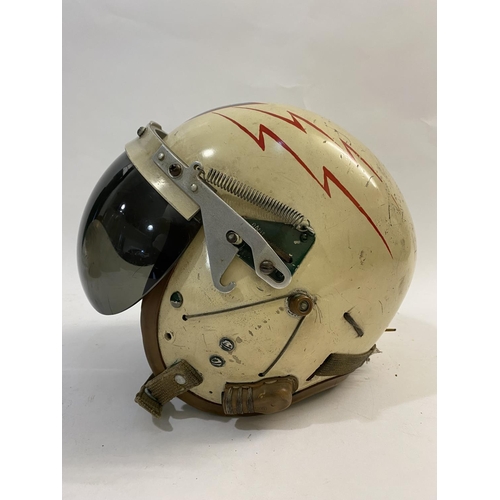 733 - A UNITED STATES AIRFORCE PILOT'S HELMET. A mid 10th century U.S. Airforce helmet, the outer shell pa... 