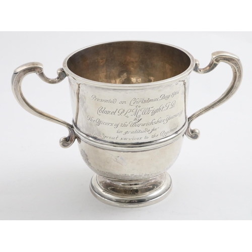 738 - A WARWICKSHIRE YEOMANRY SILVER TROPHY. A two handled silver trophy cup with inscription 'Presented o... 