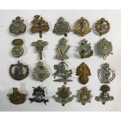 745 - A COLLECTION OF REGIMENTAL CAP BADGES. A collection of 20 regimental cap badges including 16th Lance... 