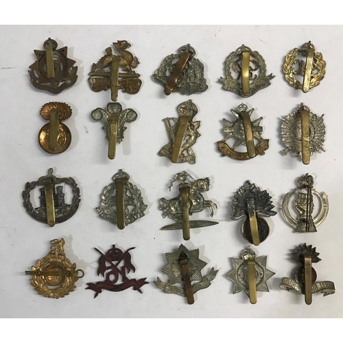 745 - A COLLECTION OF REGIMENTAL CAP BADGES. A collection of 20 regimental cap badges including 16th Lance... 