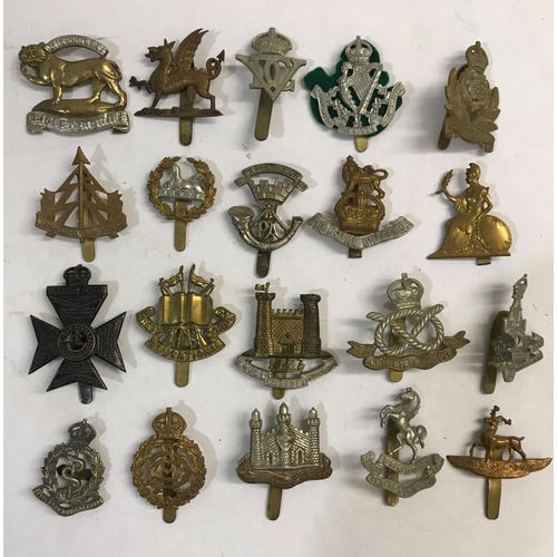 746 - A COLLECTION OF REGIMENTAL AND CORPS CAP BADGES. A collection of 20 cap badges including Reconnaissa... 