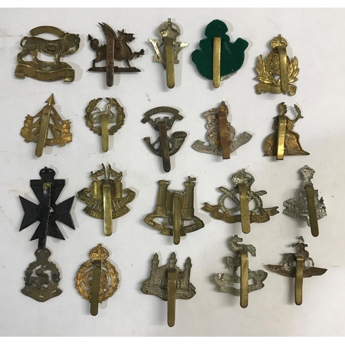 746 - A COLLECTION OF REGIMENTAL AND CORPS CAP BADGES. A collection of 20 cap badges including Reconnaissa... 