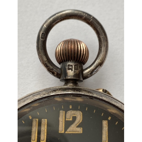 753 - A SILVER CASED ARMY ISSUE POCKET WATCH. An open faced pocket watch, the black dial with seconds dial... 