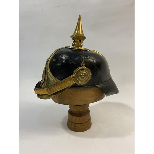 757 - A 19TH CENTURY SWEDISH INFANTRY OFFICERS PICKELHAUBE. A lacquered black leather Swedish Infantry Off... 