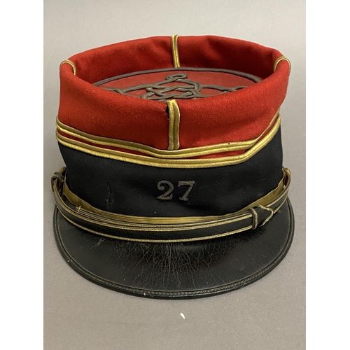 763 - A MID 20TH CENTURY FRENCH INFANTRY OFFICERS KEPI, 27TH INFANTRY REGIMENT. A Kepi cap with red fabric... 