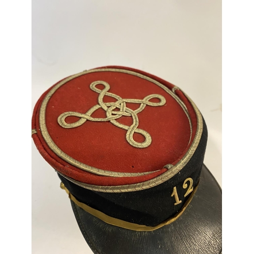 764 - A MID 20TH CENTURY FRENCH INFANTRY OFFICERS KEPI, 12TH INFANTRY REGIMENT. A Kepi cap with red fabric... 