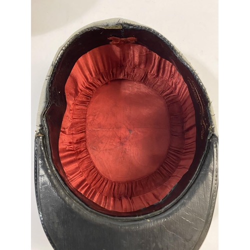 767 - A MID 20TH CENTURY FRENCH CAVALRY OFFICERS KEPI FOR A CAPTAIN. A Kepi cap with red fabric top with i... 