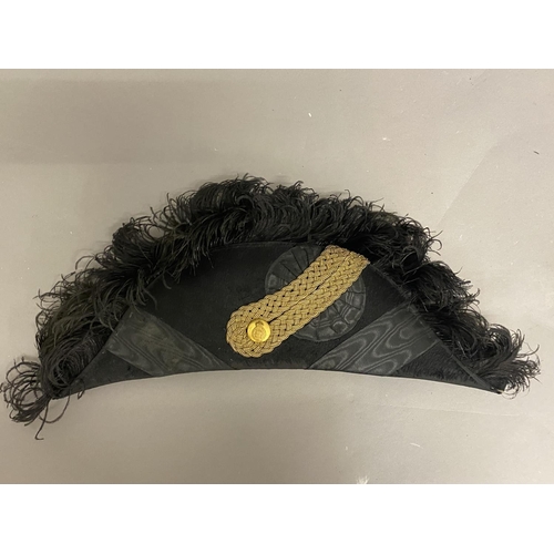 772 - A FOLDING BLACK SILK AND BRAID ROYAL NAVY STYLE BICORN HAT. The folding hat with an elaborate black ... 