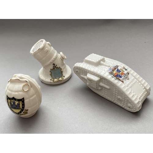 781 - THREE PIECES OF FIRST WORLD WAR CRESTED CHINA. A first World War tank by Arcadian China with a Birmi... 