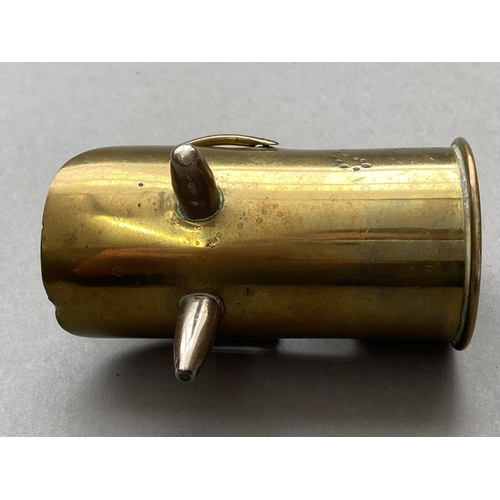 785 - A BOER WAR TRENCH ART SCUTTLE. A small scuttle formed from a brass shell, 4.2cm wide at the base, th... 