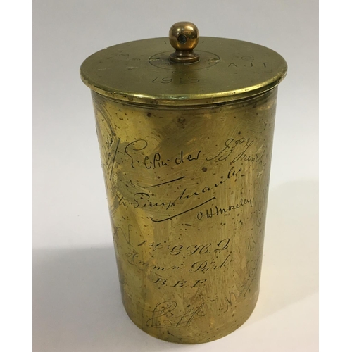 797 - A FIRST WORLD 1915 'TRENCH ART' SHELL CASE. A section of 18 pounder shell casing fitted with a suspe... 