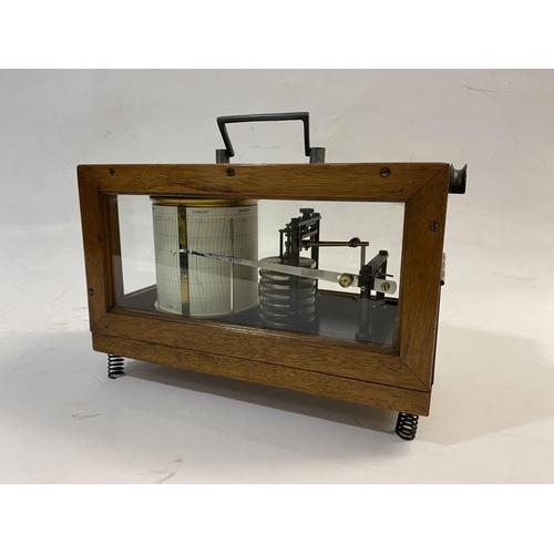 798 - A GERMAN SECOND WORLD WAR BAROGRAPH. A mahogany cased Second World War German Navy barograph with an... 