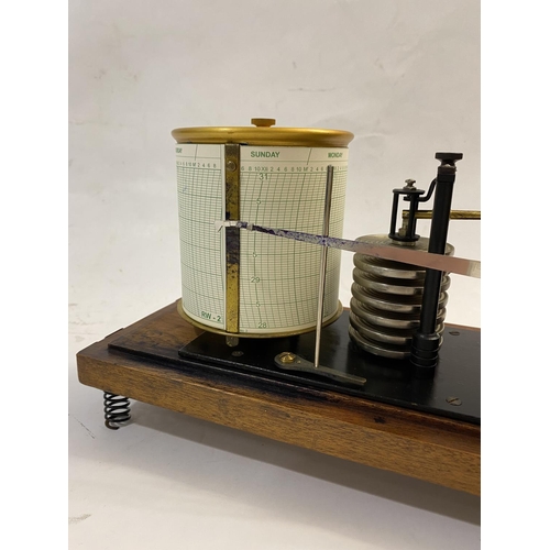 798 - A GERMAN SECOND WORLD WAR BAROGRAPH. A mahogany cased Second World War German Navy barograph with an... 