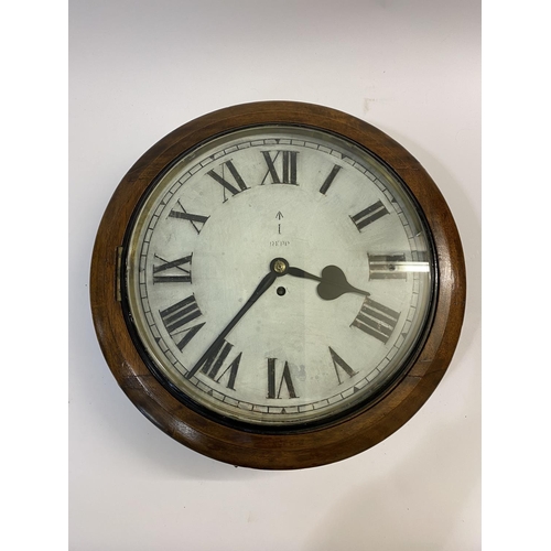 801 - AN UNUSUALLY LARGE MILITARY WALL CLOCK. With a 33cm white enamelled dial with Roman numerals, with g... 