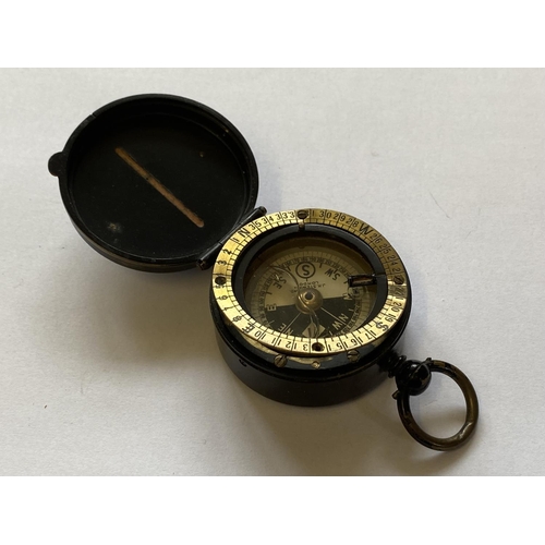 808 - A CAVALRY SCHOOL COMPASS. In the military blackened brass style, maker J H Steward London. 50mm x 25... 