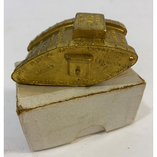 815 - A McKECHNIE BRASS FIRST WORLD WAR TANK. An early 20th Century promotional bronze paperweight in the ... 