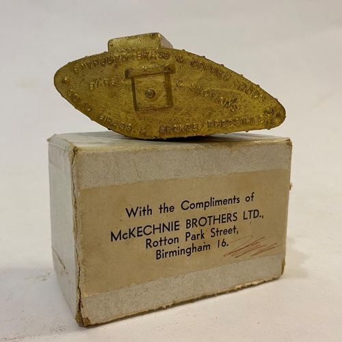 815 - A McKECHNIE BRASS FIRST WORLD WAR TANK. An early 20th Century promotional bronze paperweight in the ... 