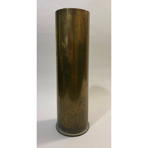 825 - A 12 POUNDER SHELL CASE. A brass 12 pounder Naval shell case, marked to the underside 'Mk9 12LB RNB ... 