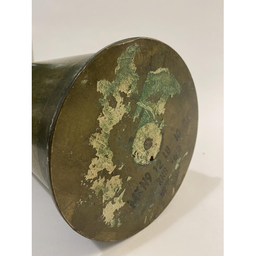 825 - A 12 POUNDER SHELL CASE. A brass 12 pounder Naval shell case, marked to the underside 'Mk9 12LB RNB ... 