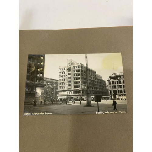 839 - TWO PHOTOGRAPH ALBUMS BELONGING TO FLT L. ADCOCK. An album of photographs and postcards of Berlin in... 