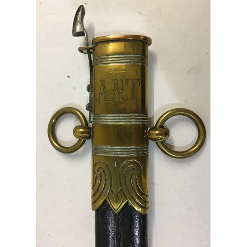 875 - AN EDWARD VII NAVAL DIRK AND SCABBARD. An Edward VII Midshipman's Dirk with a 45cm pointed decorated... 