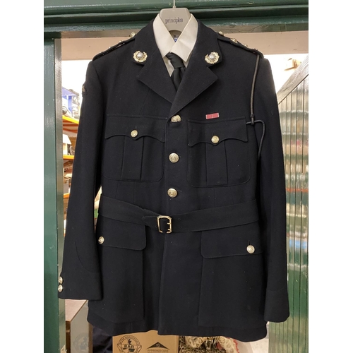 877 - A ROYAL MARINES 'BLUES' UNIFORM. A uniform by Rogers John Jones Ltd of Mayfair, the label named 'Lt ... 