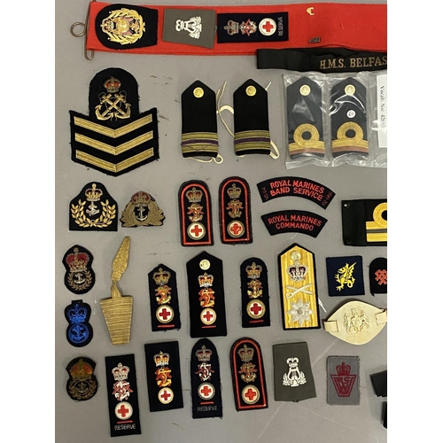 880 - NAVAL BADGES AND UNIFORM MARKINGS. A collection of British Royal Navy and similar uniform rank and s... 