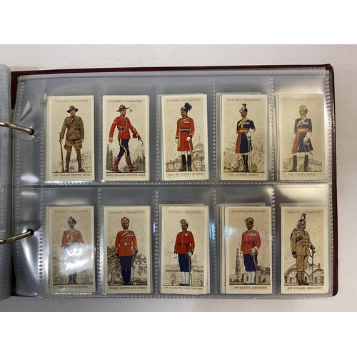 883 - THREE ALBUMS OF CARDS, COVERS AND STAMPS RELATING TO NAVAL HISTORY. A large collection of cigarette ... 