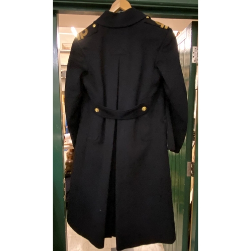 889 - A ROYAL NAVY GREAT COAT. A post Second World War Naval Great Coat by E.J. Whitaker and Sons of Chath... 