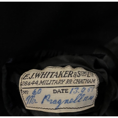 889 - A ROYAL NAVY GREAT COAT. A post Second World War Naval Great Coat by E.J. Whitaker and Sons of Chath... 