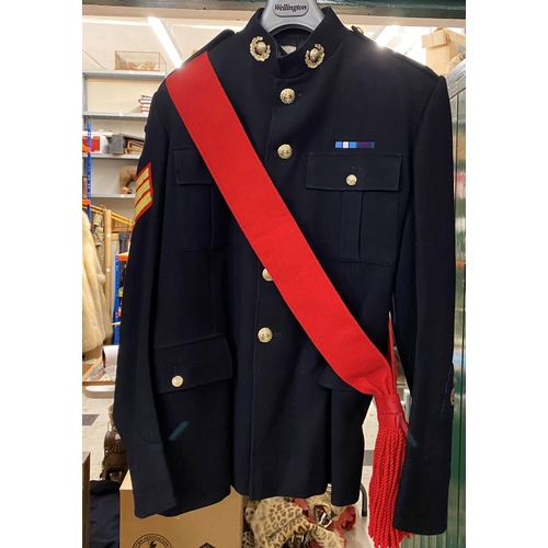 890 - A ROYAL MARINES No.1 DRESS JACKET. A No.1 Dress Jacket Size 25A by H, Edgard and Sons with red sash ... 